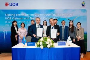UOB Vietnam has just signed a green credit agreement with Nam Viet JSC. (Photo: SGGP)