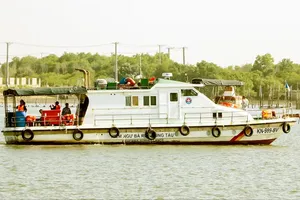 A fisheries patrol vessel on duty on the Dinh River, HCMC