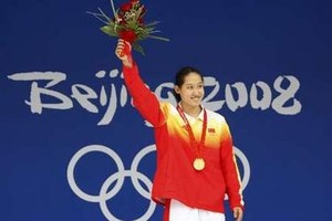 Liu Captures China's First Beijing Swimming Gold