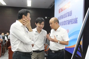 Các chuyên gia, đại biểu thảo luận tại hội thảo khoa học. Ảnh: XUÂN QUỲNH