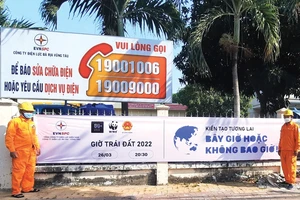 Băng rôn tuyên truyền Giờ Trái đất 2022 trước trụ sở Công ty Điện lực Bà Rịa - Vũng Tàu