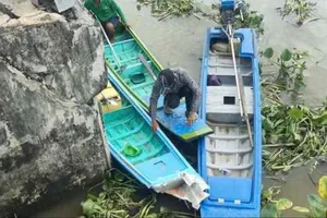 Người dân đang tiếp tục tìm kiếm nạn nhân