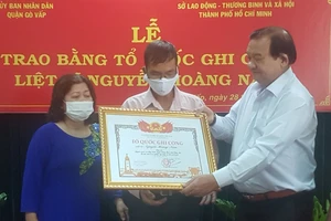 Cấp bằng Tổ quốc ghi công cho liệt sĩ “hiệp sĩ” Nguyễn Hoàng Nam