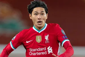 Minamino di chuyển bằng phi cơ riêng đến Hà Nội để chuẩn bị đấu với đội tuyển Việt Nam. Ảnh: AP