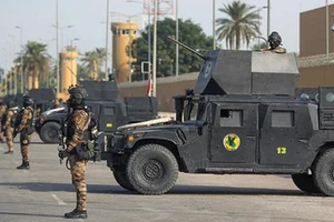 Người ủng hộ giáo sĩ Iraq rút khỏi vùng Xanh