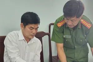 Đối tượng Trần Viết Kiều tại cơ quan công an. Ảnh: Theo Nhandan.vn