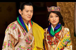 不丹国王吉格梅·凯萨尔·纳姆耶尔·旺楚克与王后吉增．佩玛。