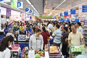 Saigon Co.op bắt tay Grab tạo thêm tiện ích cho khách hàng