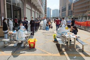 中國疫情再起波瀾。(圖: AFP)