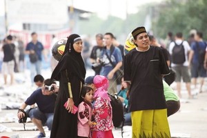 開齋節當天清晨，穆斯林家人會穿戴整潔體面出門團拜。 （圖源：互聯網）