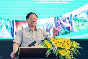 政府總理范明政。