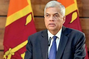 斯里蘭卡總理維克拉馬辛哈宣誓就任臨時總統。