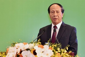 政府副總理黎文成在會上發表指導意見。