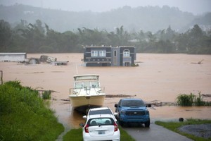 颶風“菲奧娜”帶來大規模降雨，並致全境斷電。圖源：互聯網