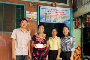 华人妇女获移交温情屋