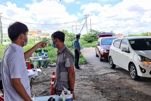 Long An kích hoạt 19 chốt kiểm soát, sau khi phát hiện thêm 2 ca dương tính 