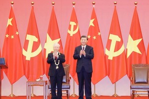 黨中央總書記阮富仲與中共中央總書記,國家主席習近平。