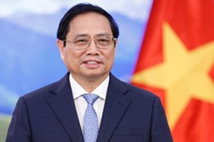 政府总理范明政。