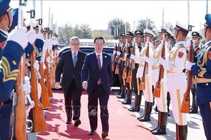 国家主席武文赏与越南高级代表团送行仪式在北京举行。图自越通社