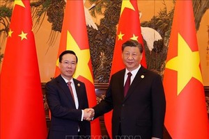 越南国家主席武文赏会见中共中央总书记、国家主席习近平。