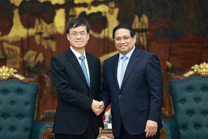 政府总理范明政会见中国退役军人事务部部长裴金佳。图自越通社