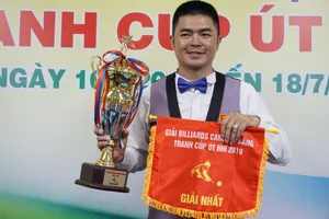 Cơ thủ Nguyễn Quốc Nguyện với chức vô địch. 
