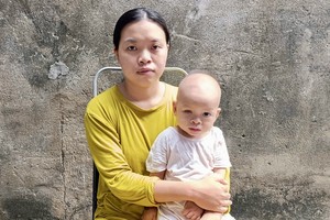 段氏春鲜与患病的幼子黎功福兴。