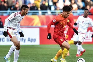 Đội Trung Quốc (áo đỏ) giành chiến thắng 3-0 trước Oman (AFC)