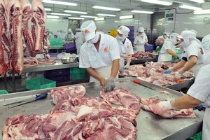 Enterprises pledge to stabilize pork prices