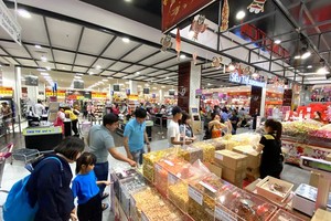 Sweetmeat for Tet holidays sold at a supermarket. (Photo: SGGP)