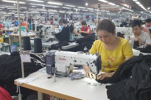 Garment, textile enterprises long for solutions to solve difficulties