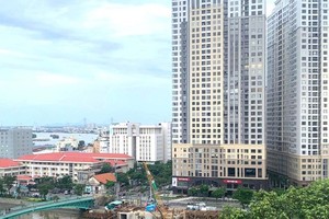 Real estate enterprises promote corporate bond issuance to mobilize capital. (Photo: SGGP)