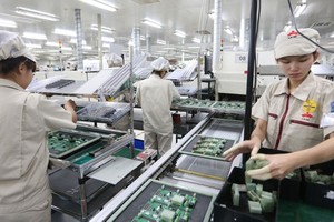 Electronic product manufacturing at UMC Vietnam Company in Hai Duong Province. (Photo: SGGP)
