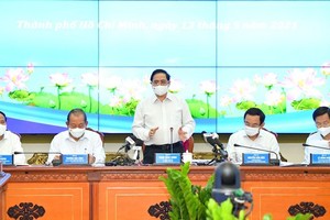 Newly-elected PM has first meeting with HCMC’s leaders