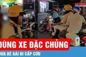 Cảnh sát giao thông TPHCM dùng xe đặc chủng đưa bé gái đi cấp cứu