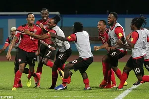 Các cầu thủ Trinidad and Tobago trong trận thắng 2 - 1 trước tuyển Mỹ. Ảnh: REUTERS