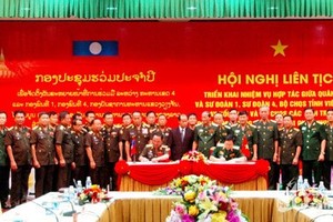 Delegates at the conference on cooperation between Military Zone 4 High Command and Laos’s military ​units in Nghe An province (Source: baonghean.vn)