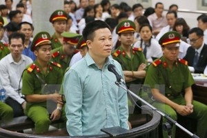 Former OceanBank Chairman Ha Van Tham in court (Source: VNA)