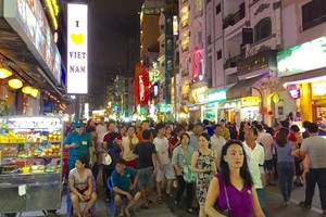 B​ui Vien Walking Street in HCM City’s District 1 has become a popular spot for locals and international tourists. (Photo: VNA)