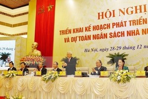 General Secretary of the Communist Party of Vietnam Central Committee Nguyen Phu Trong, President Tran Dai Quang and National Assembly Chairwoman Nguyen Thi Kim Nga attend the Government meeting with localities (Photo: VNA)