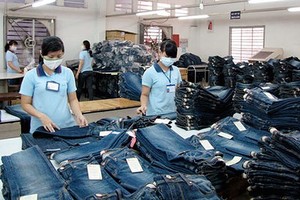 Hanoi’s highest Tet bonus of VND325 million belongs to a foreign-direct-investment (FDI) enterprise. (Photo: Sggp)