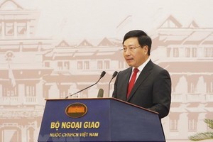 Deputy Prime Minister and Minister of Foreign Affairs Pham Binh Minh opens the 30th Diplomatic Conference (Photo: VNA)