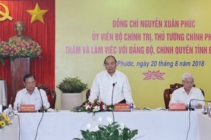 Prime Minister Nguyen Xuan Phuc (C) (Source: VNA)