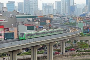 A train during the trial operation (Photo: VNA)