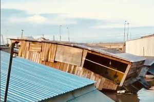 Houses collapse after landslide.
