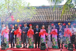At a ribbon cutting ceremony