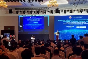 At the conference. (Source: www.hochiminhcity.gov.vn)