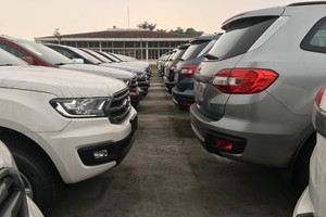 Imported cars  gather in parking lots in Sai Dong Ward in Hanoi's Long Bien District