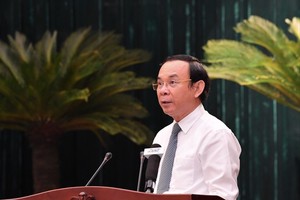 Secretary of the Party Central Committee and Secretary of the Party Committee of HCMC, Nguyen Van Nen speaks at the conference. (Photo: SGGP)