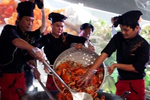 A giant pan of crab with tamarind sauce at a food festival in Ca Mau Province